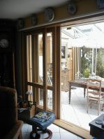Portes coulissantes en chêne avec ouverture totale